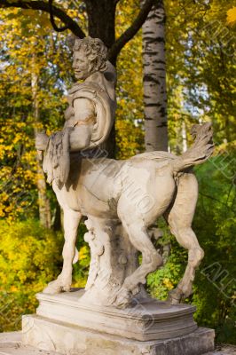 Statue of a happy centaur in park