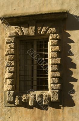 Volterra (Pisa) - Window of ancient palace with shadows