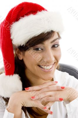 smiling female accountant in christmas hat