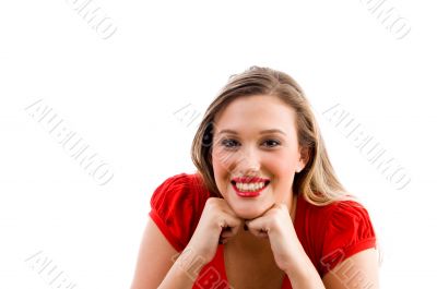 female model posing with her chin on fists female model posing with her chin on fists