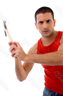 handsome man holding hammer handsome man holding hammer