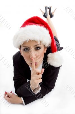 businesswoman with christmas hat instructing