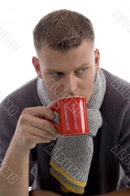 handsome young man drinking coffee