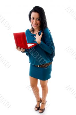 pleased woman with box on white background