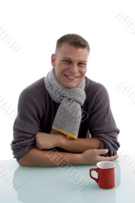 smiling handsome man with coffee mug