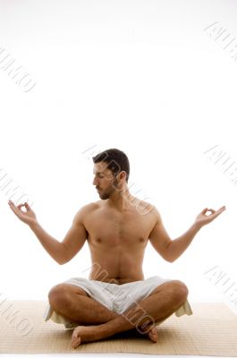 front view of man in yoga pose front view of man in yoga pose