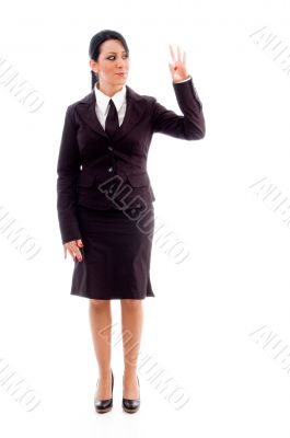 standing lawyer showing counting hand gesture