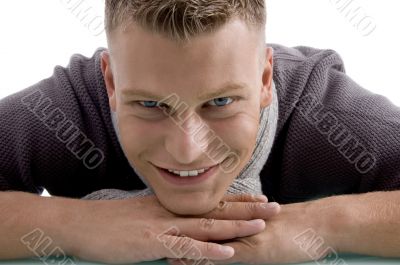 laying adult model looking at camera laying adult model looking at camera