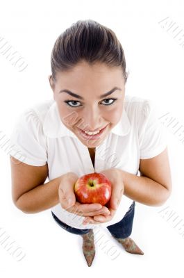 beautiful young female holding an apple