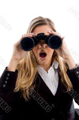 young woman eyeing with binoculars