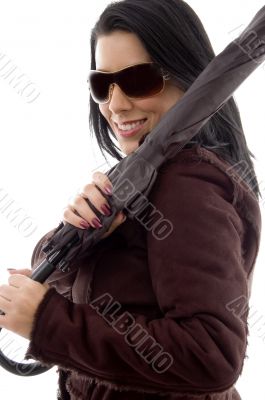 female holding umbrella on white background