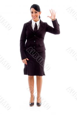 young businesswoman showing counting hand gesture