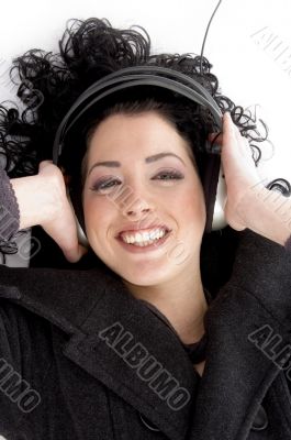 high angle view of woman wearing headphone high angle view of woman wearing headphone