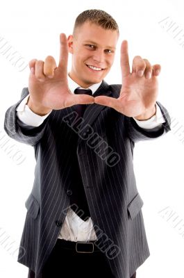 business man making frame hand gesture