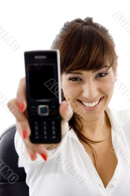 smiling businesswoman showing her cell phone