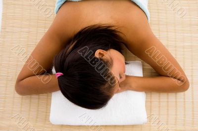 resting beautiful adult woman in towel