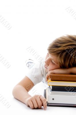 half length view of boy sleeping on books half length view of boy sleeping on books
