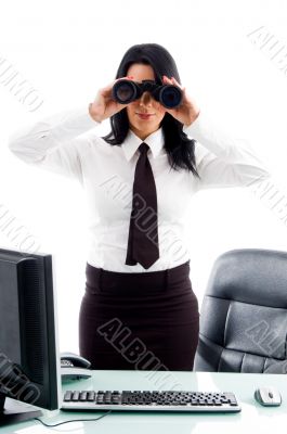 executive looking through binocular