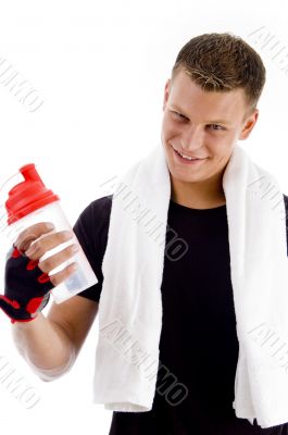 smiling muscular man with water bottle