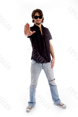 standing male showing stopping hand gesture standing male showing stopping hand gesture