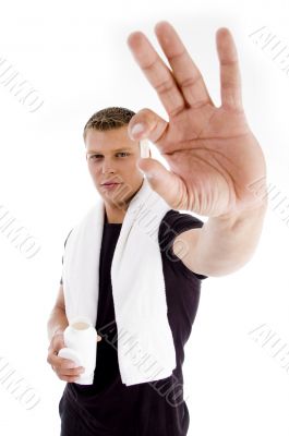 muscular male holding medicine