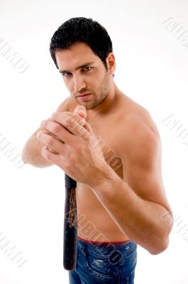 side view of male holding stick side view of male holding stick