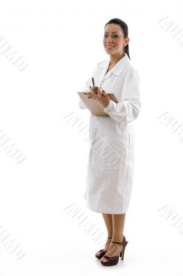 side view of doctor with writing pad