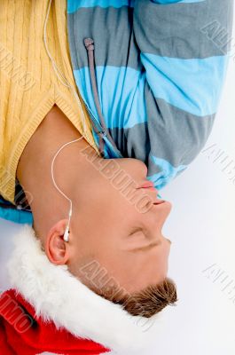 sleeping man with christmas hat and ear phones