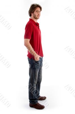 side view of young male standing side view of young male standing