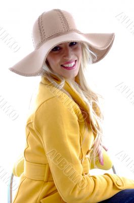 side view of young model with hat