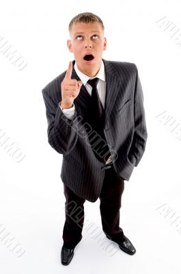 shocked standing businessman pointing upside