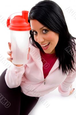 smiling female with bottle on white background