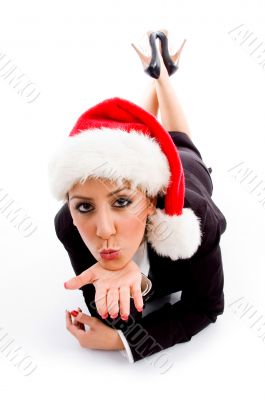 employee with christmas hat giving flying kiss
