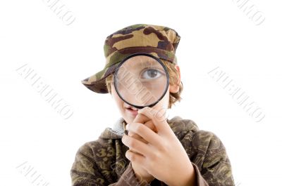 portrait of little boy looking through lens