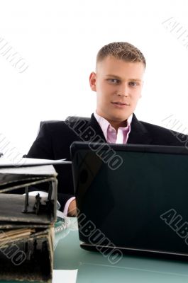businessman with laptop and files