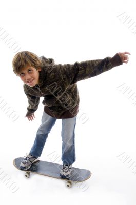 front view of boy riding skate