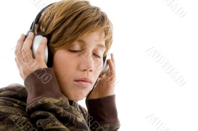 portrait of teen listening music