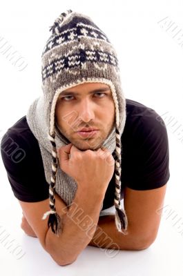 fashionable man posing in woolen hat