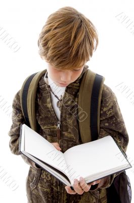 front view of school child reading