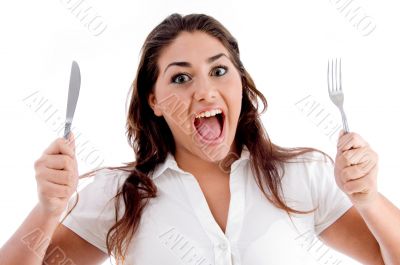 portrait of shouting woman with fork and knife portrait of shouting woman with fork and knife