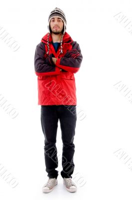 full body pose of young man in woolen cap