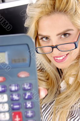close view of woman showing calculator