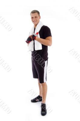 standing adult male holding towel standing adult male holding towel