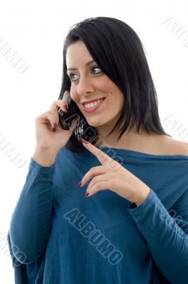 smiling female talking on mobile on white backgrou