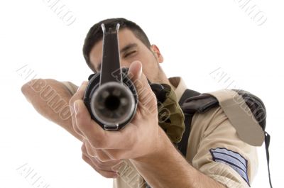 portrait of young soldier aiming