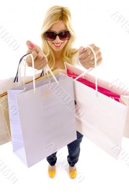 high angle view of woman holding paper bags