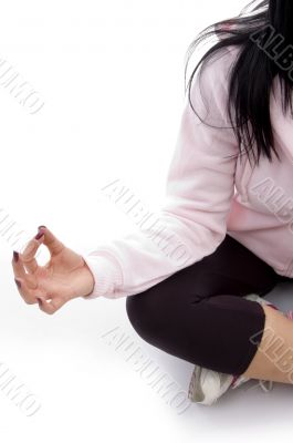 half length view of female in lotus pose