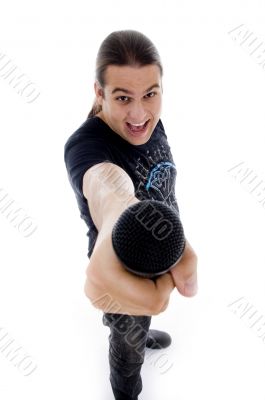 young singer holding microphone young singer holding microphone