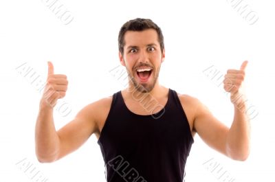 portrait of male with thumbs up portrait of male with thumbs up