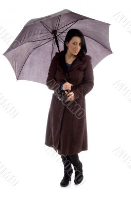 front view of woman holding umbrella